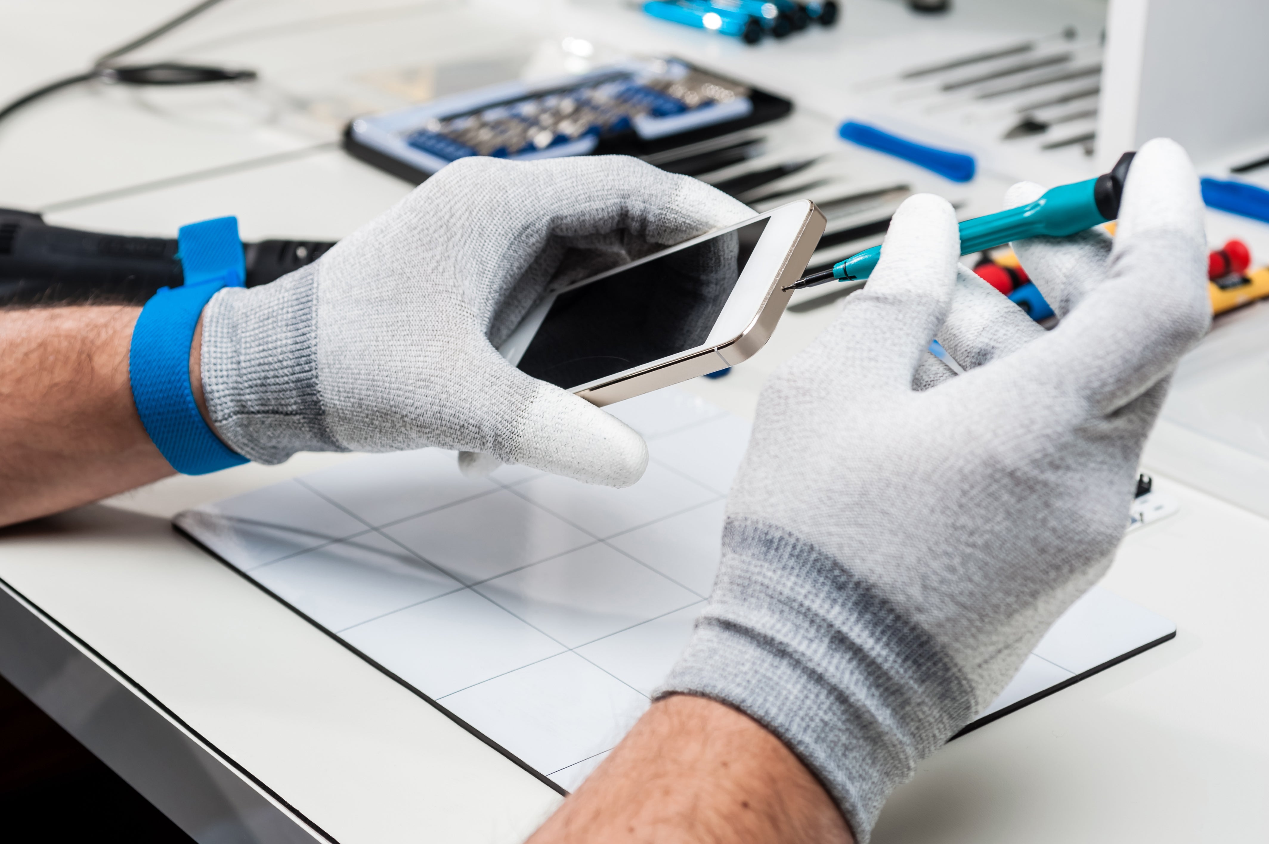 Smartphone being professionally refurbished